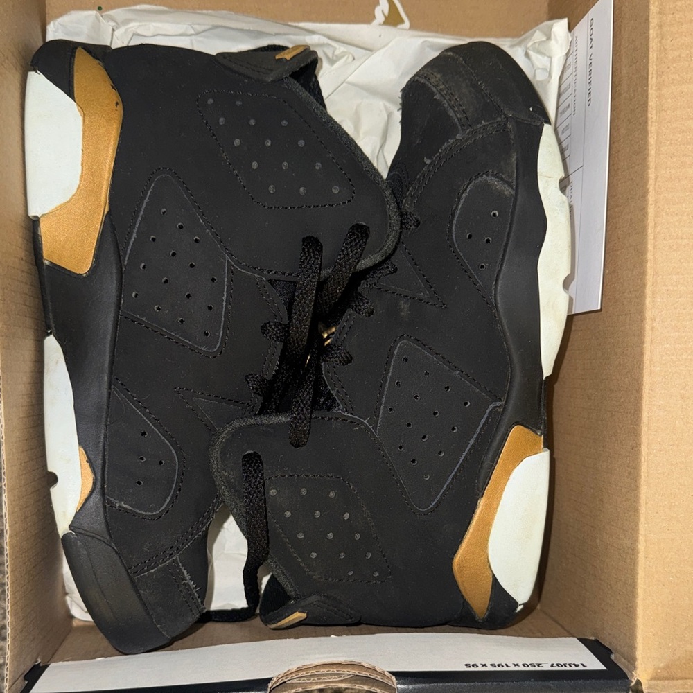 Jordan Black and Gold Sneakers